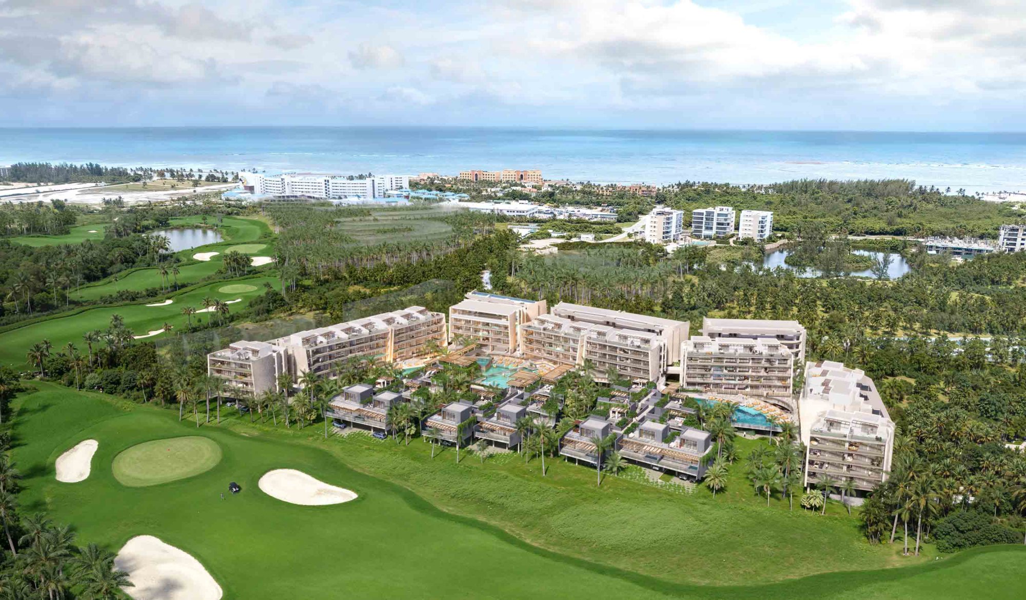 Aerial rendering of Andara Cap Cana: its 175 residences set behind the Las Iguanas golf course, with the Cap Cana coastline beyond.