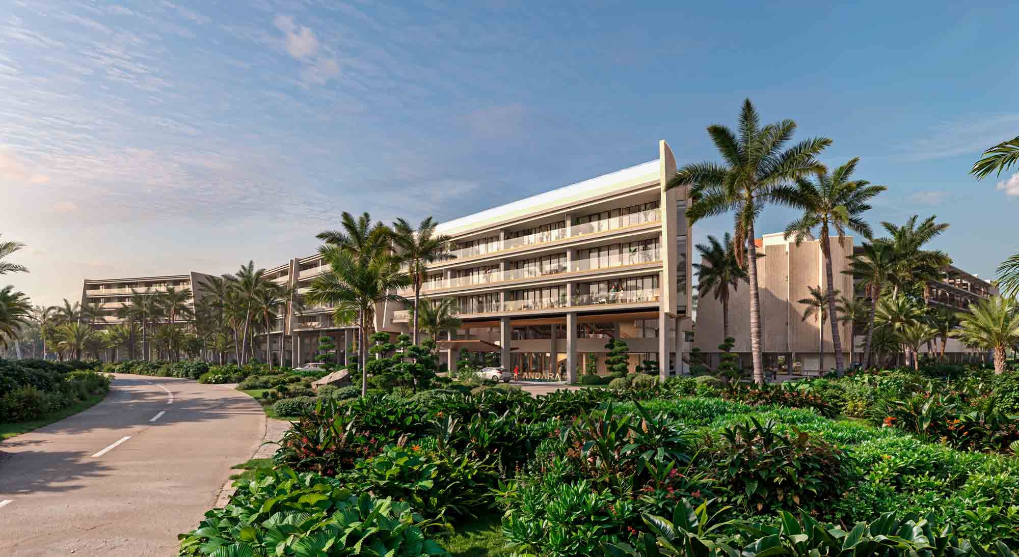Rendering of Andara Cap Cana seen from its access road at dusk, the cream facade of a development planned with 175 residences beside the golf course.